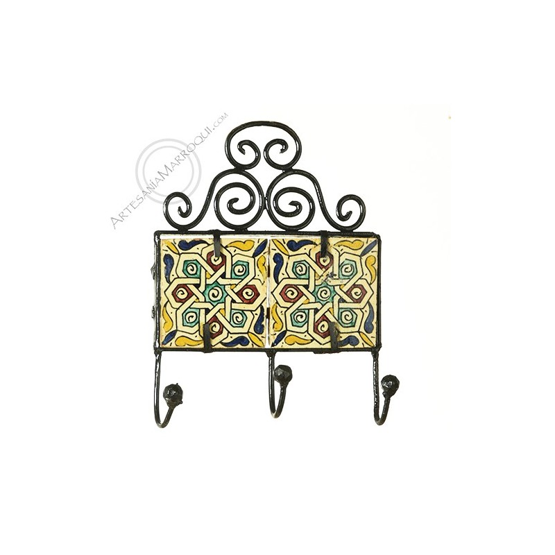 Wrought iron coat rack with three hooks with tiles